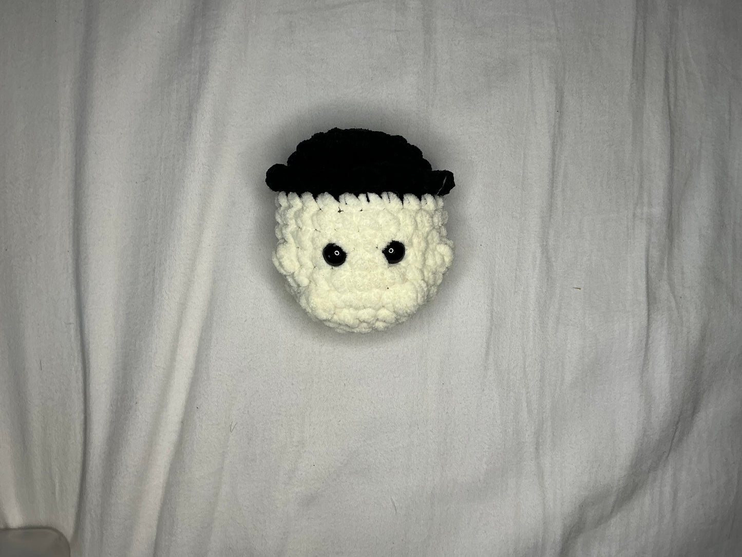 Mushroom boi with a black cap
